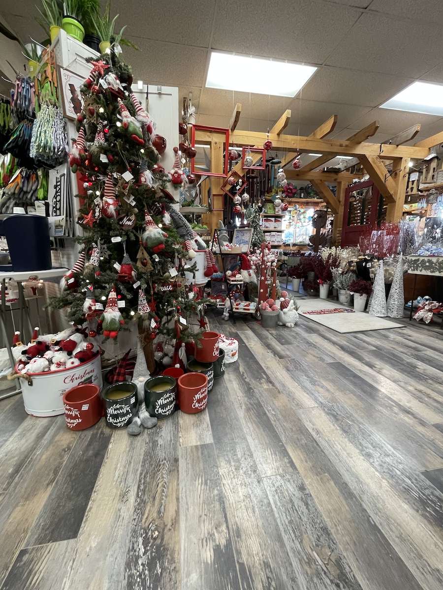 Shawano Lawn & Stone gift shop decorated for Christmas Haus with Christmas Tree