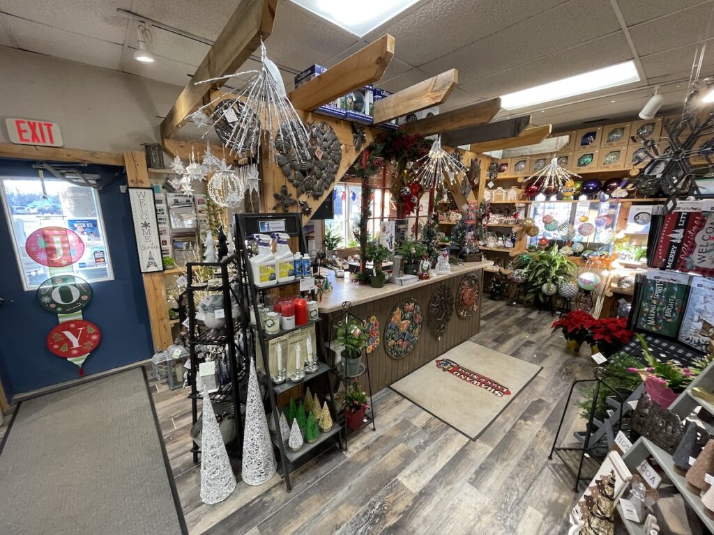 Shawano Lawn & Stone gift shop front counter decorated for Christmas Haus