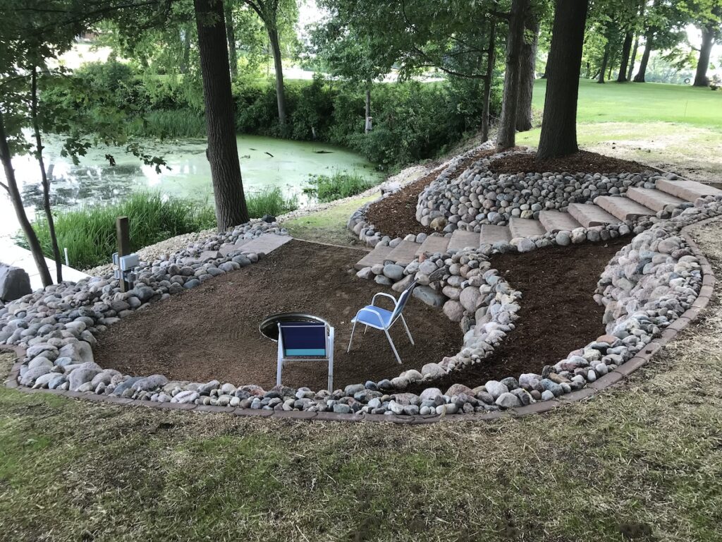 lake front landscaping by Shawano Lawn & Stone
